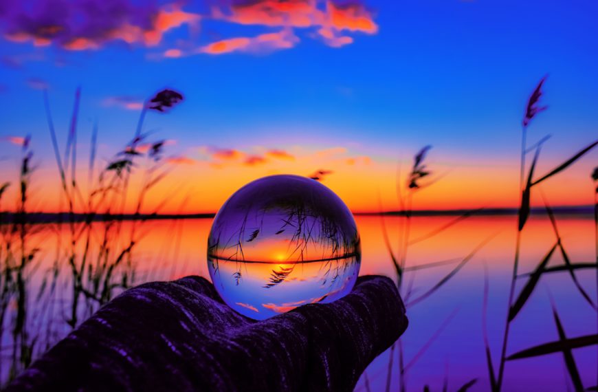 The picture shows a crystal ball to represent predictions for 2023 in higher ed.