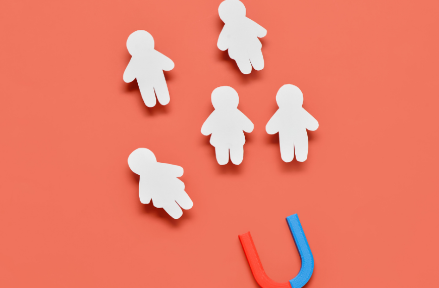 The picture shows cut-outs of children to represent student retention.