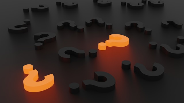 The image shows questions marks to represent the 6 questions about budgets in this article.