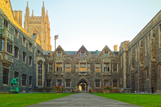 The picture is of a building on a college campus to represent financial stability at universities.